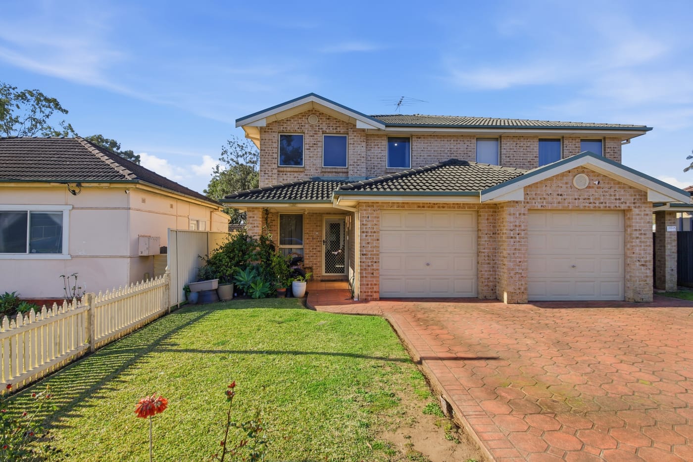 Object removal premium edit — the same driveway with the car removed, before shown inset
