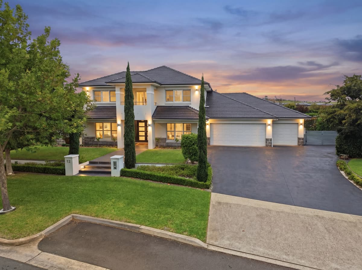 Two-storey home at Wilton photographed at dusk