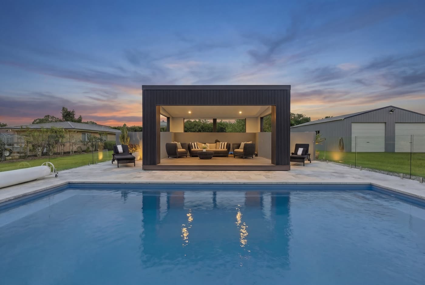 Pool and cabana at dusk, Wilton