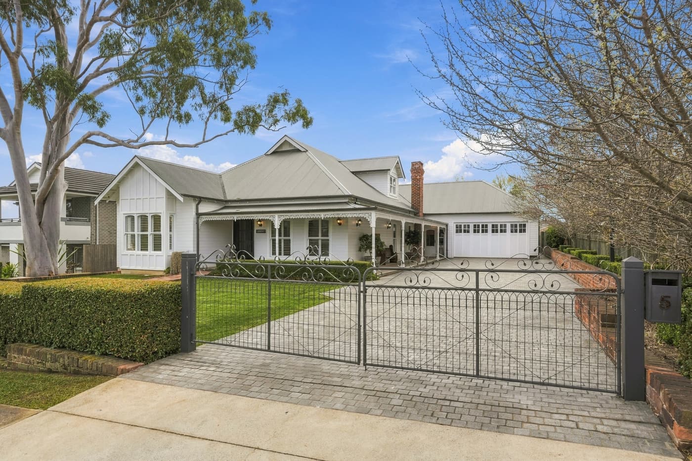Heritage home behind its front gate, Elderslie